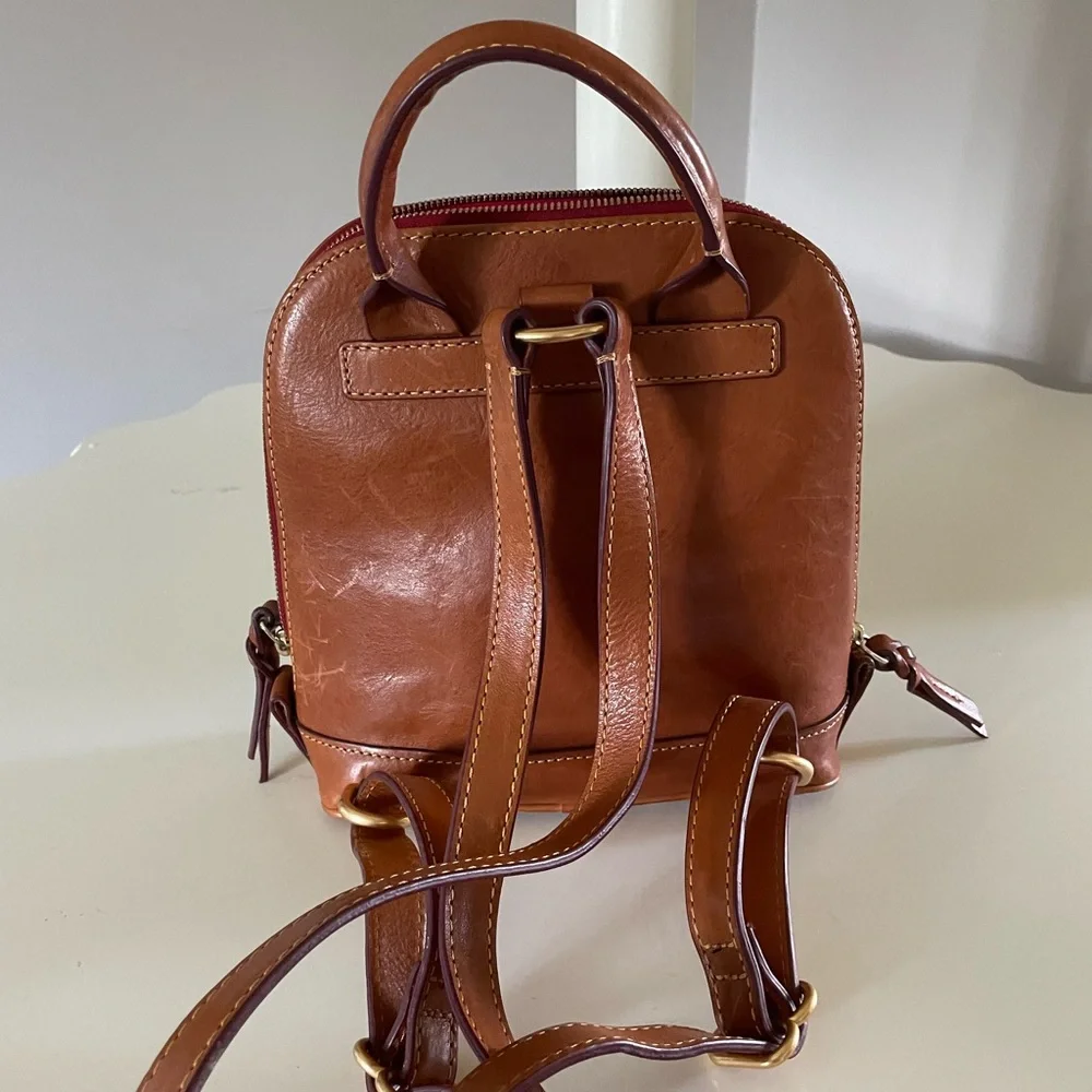 Dooney and Bourke Florentine leather small backpack.